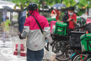 foodpanda grab food delivery riders gig economy meituan